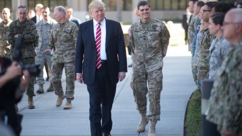President Donald Trump and Gen. Joseph Votel, commander of US Central Command, meet with service members at MacDill, AFB, Florida, Feb. 6, 2017. (DoD photo by D. Myles Cullen/Released). (Photo via Smith Collection/Gado/Getty Images)