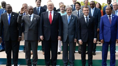 Kenya's President Uhuru Kenyatta; Guinea's President Alpha Conde; US President Donald Trump; Italian Prime Minister Paolo Gentiloni; French President Emmanuel Macron; and Niger's President Mahamadou Issoufou pose for a family photo with other participants of the G7 summit in Taormina, Sicily on May 27, 2017. (Photo by Stephane De Sakutin/AFP/Getty Images)
