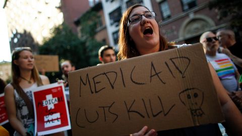 A small group of activists rally against the GOP health care plan outside of the Metropolitan Republican Club, in New York City on July 5, 2017.. Republicans in the Senate will resume work on the bill next week when Congress returns to Washington after a holiday recess. (Photo by Drew Angerer/Getty Images)