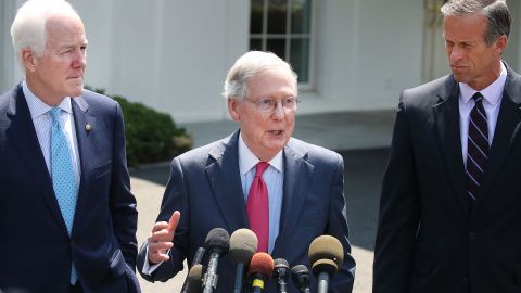 Senate Majority Leader Mitch McConnell (R-KY)(center), Sen. John Thune (R-SD)(right) and Sen. John Cornyn (R-TX) speak to the media at the White House on July 19, 2017. The senators met with President Donald Trump to discuss the health care bill. (Photo by Mark Wilson/Getty Images)