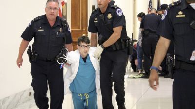 Arrests by Capitol Police at the July 10, 2017 protests over health care on Capitol Hill. (Photo by Emily Marie Ahtunan)