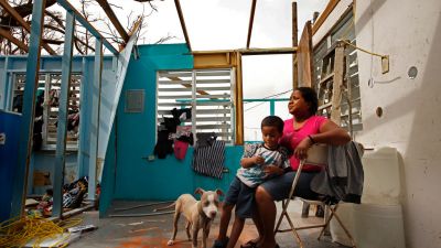 Heydee Perez, 29, and her son, Yenel Calera, 4, at Rio Grande, Puetro Rico on Sept. 27, 2017. They have not received any aid one week after Hurricane Maria. The roof of their home is gone and they have very little to eat. (Photo by Carolyn Cole/Los Angeles Times via Getty Images)