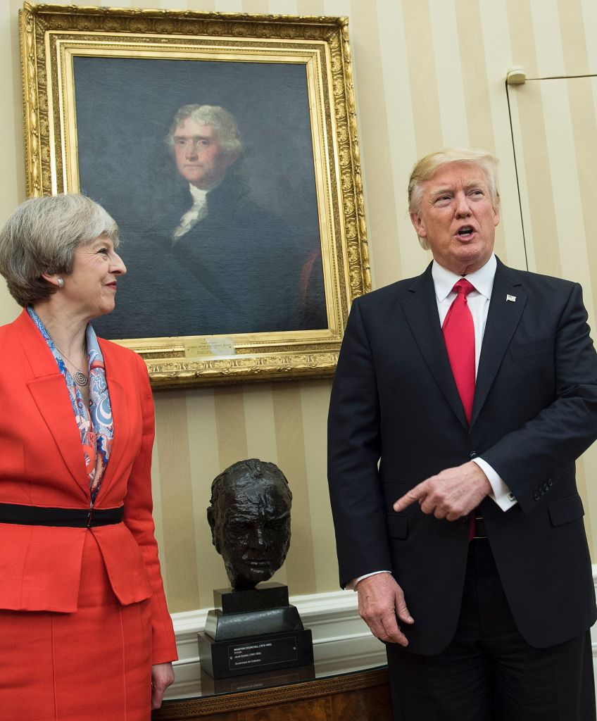 British Prime Minister Theresa May and President Trump meet beside a bust of former British Prime Minister Winston Churchill in the Oval Office of the White House on Jan. 27, 2017 in Washington, DC. (Brendan Smialowski/AFP/Getty Images)