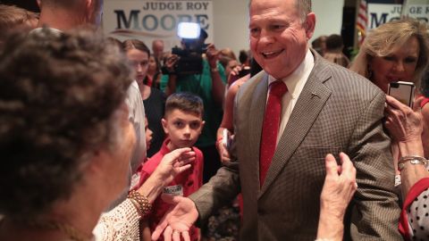 Roy Moore, Republican candidate for the US Senate in Alabama, greets supporters at an election-night rally after declaring victory on Sept. 26, 2017 in Montgomery, Alabama. Moore will now face Democratic candidate Doug Jones in the general election in December. (Photo by Scott Olson/Getty Images)