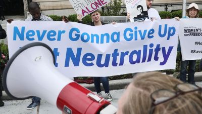 Proponents of net neutrality protest against Federal Communication Commission Chairman Ajit Pai outside the American Enterprise Institute before his arrival May 5, 2017 in Washington, DC. (Photo by Chip Somodevilla/Getty Images)