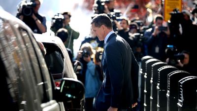 Michael Flynn, former national security advisor to President Donald Trump, leaves following his plea hearing at the Prettyman Federal Courthouse, December 1, 2017, in Washington, DC. Special Counsel Robert Mueller charged Flynn with one count of making a false statement to the FBI. (Photo by Chip Somodevilla/Getty Images)