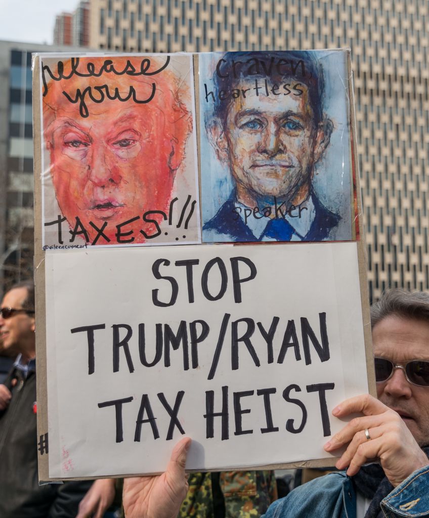 Hundreds of activists held a rally in Foley Square before marching to Wall Street to protest Congress' tax bill, which was approved by the US Senate in the early morning hours of Dec. 2, 2017. (Photo by Albin Lohr-Jones/Pacific Press/LightRocket via Getty Images)