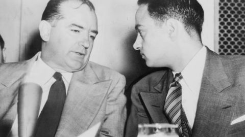 Sen. Joseph McCarthy chats with his attorney Roy Cohn during Senate Subcommittee hearings on the McCarthy-Army dispute in 1954 (Credit: Library of Congress Prints and Photographs Division. New York World-Telegram and the Sun Newspaper Photograph Collection)