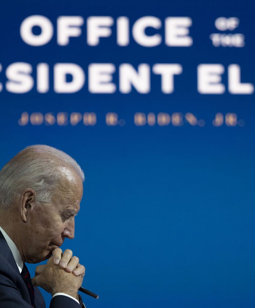 Biden says he is approaching the coronavirus with a “wartime” strategy, moving the power of the federal government behind the effort to get everyone vaccinated.(Photo by JIM WATSON/AFP via Getty Images)