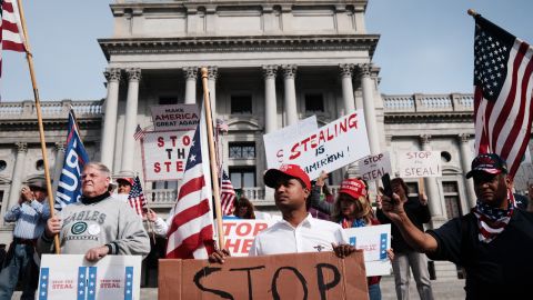 Dozens of people calling for stopping the vote count in Pennsylvania due to alleged fraud against President Donald Trump gather on the steps of the State Capital on November 05, 2020 in Harrisburg, Pennsylvania. (Photo by Spencer Platt/Getty Images)