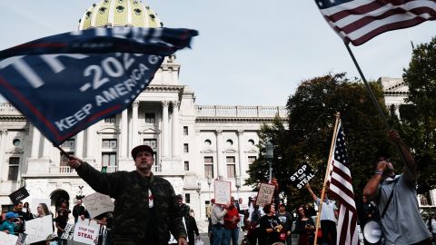 Dozens of people calling for stopping the vote count in Pennsylvania due to alleged fraud against President Donald Trump gather on the steps of the State Capital on November 05, 2020 in Harrisburg, Pennsylvania. (Photo by Spencer Platt/Getty Images)