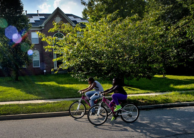 Against All Odd: Black children on bikes