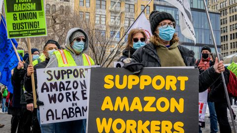 Participants seen holding signs and marching on a picket line at the protest. Members of the Workers Assembly Against Racism gathered across from Jeff Bezos-owned Whole Foods Market in Union Square South for a nation-wide solidarity event with the unionizing Amazon workers in Bessemer, Alabama. (Photo by Erik McGregor/LightRocket via Getty Images)